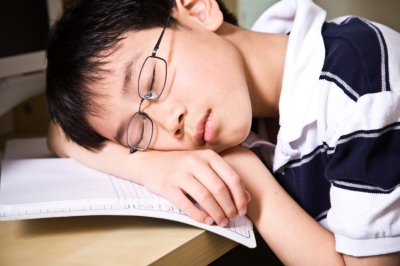 Sleeping young student